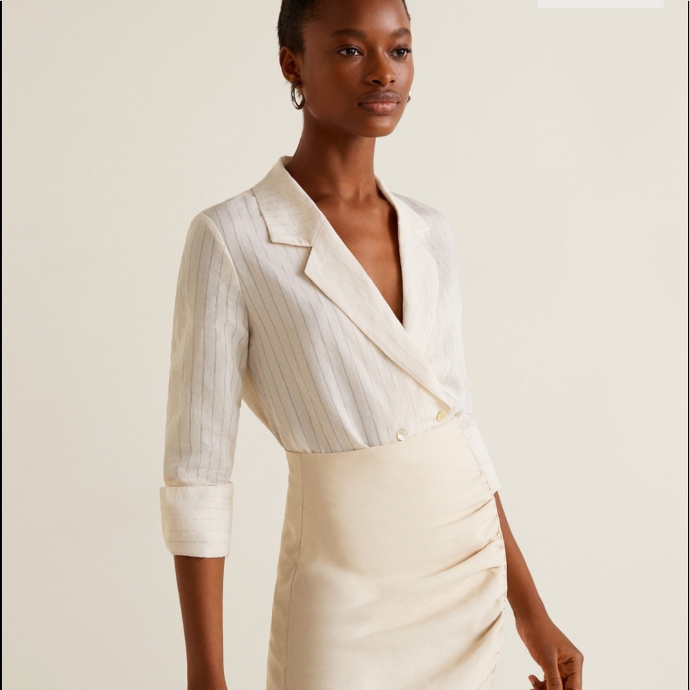 Mango off white blouse in size 6 with brown lines